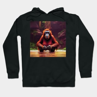 Orangutan in a golden lake Hoodie